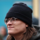 Image of a man with glasses wearing a black beanie.