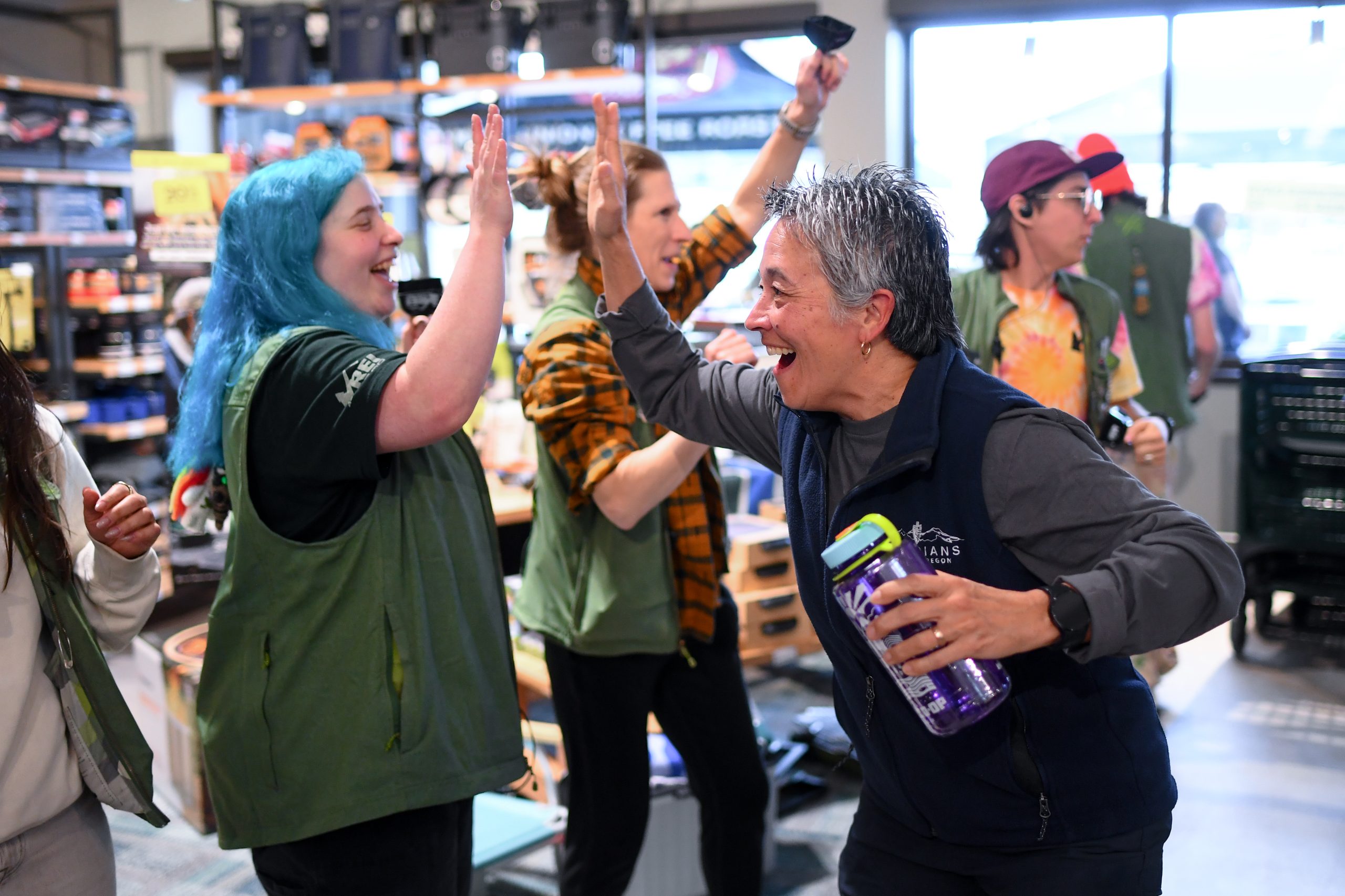 Eugene’s new REI location opens, with cowbells, freebies and ‘stoke’